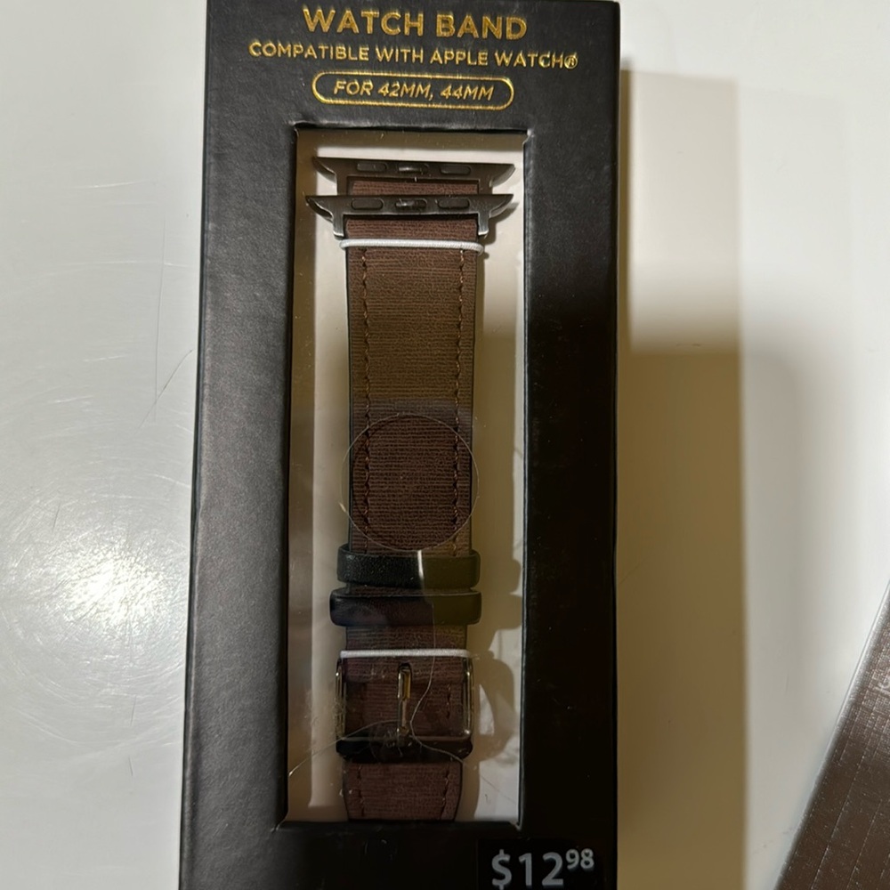 Brand new still in box. Brown leather strap for Apple Watch band